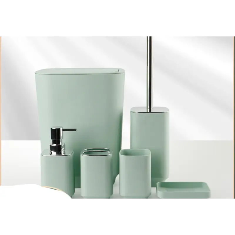Mint green bathroom accessory set.