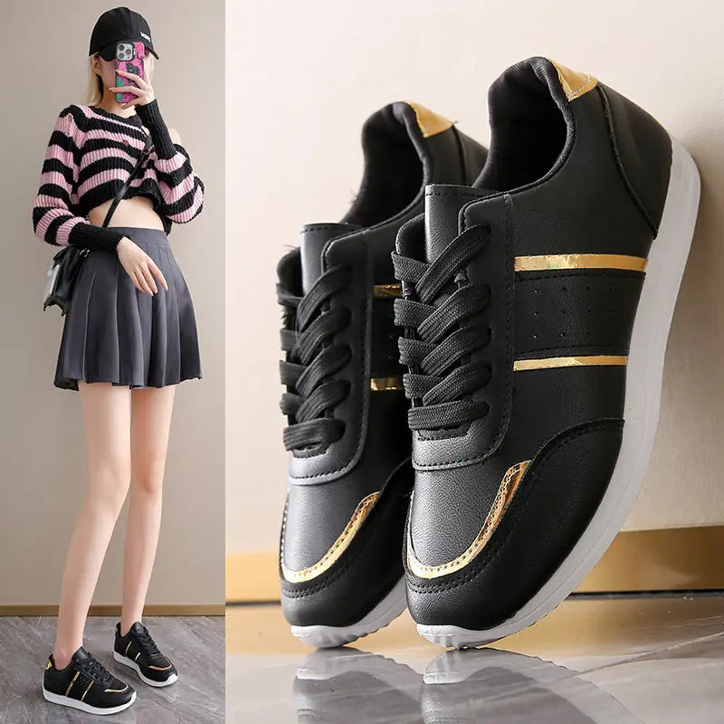 Black and gold sneakers.