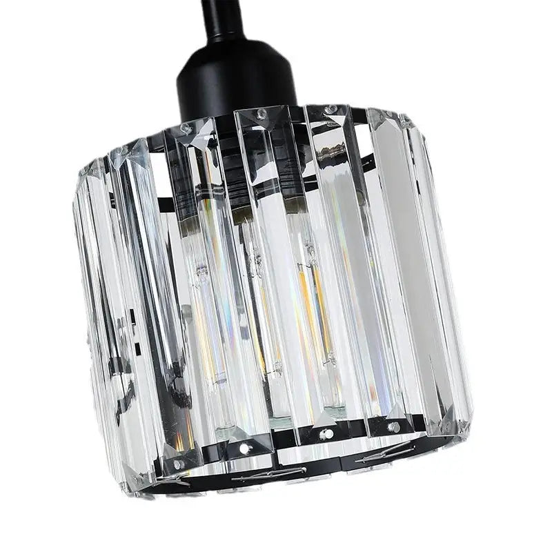 Cylindrical crystal pendant light.