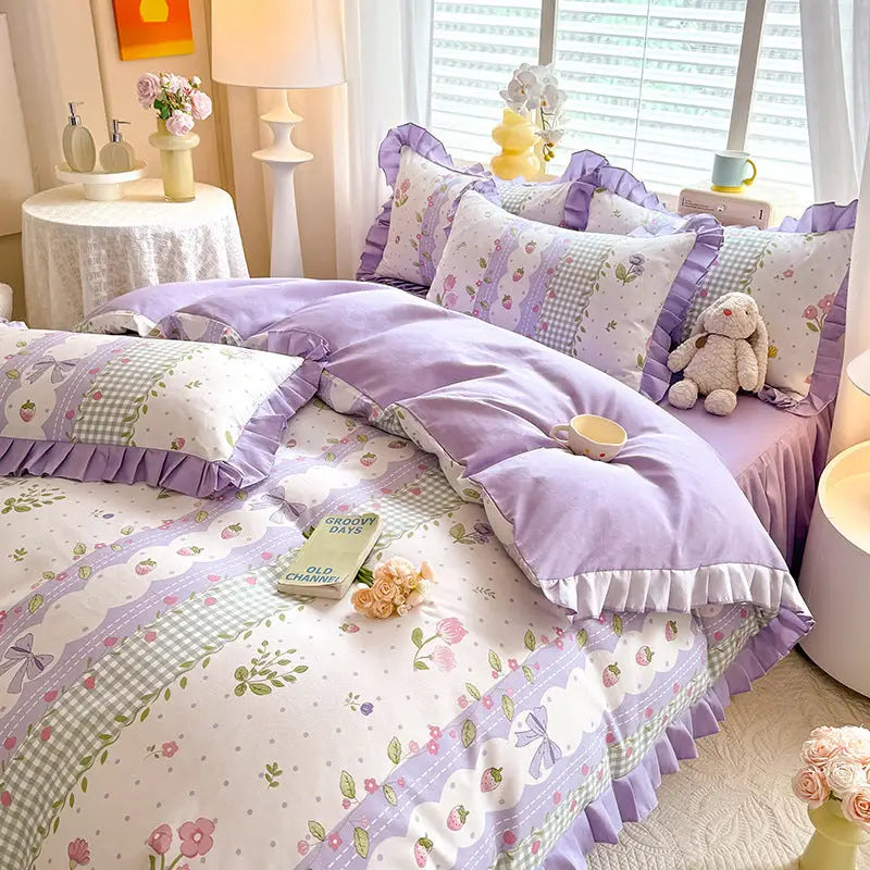 Floral and gingham patterned bedding with lavender accents.
