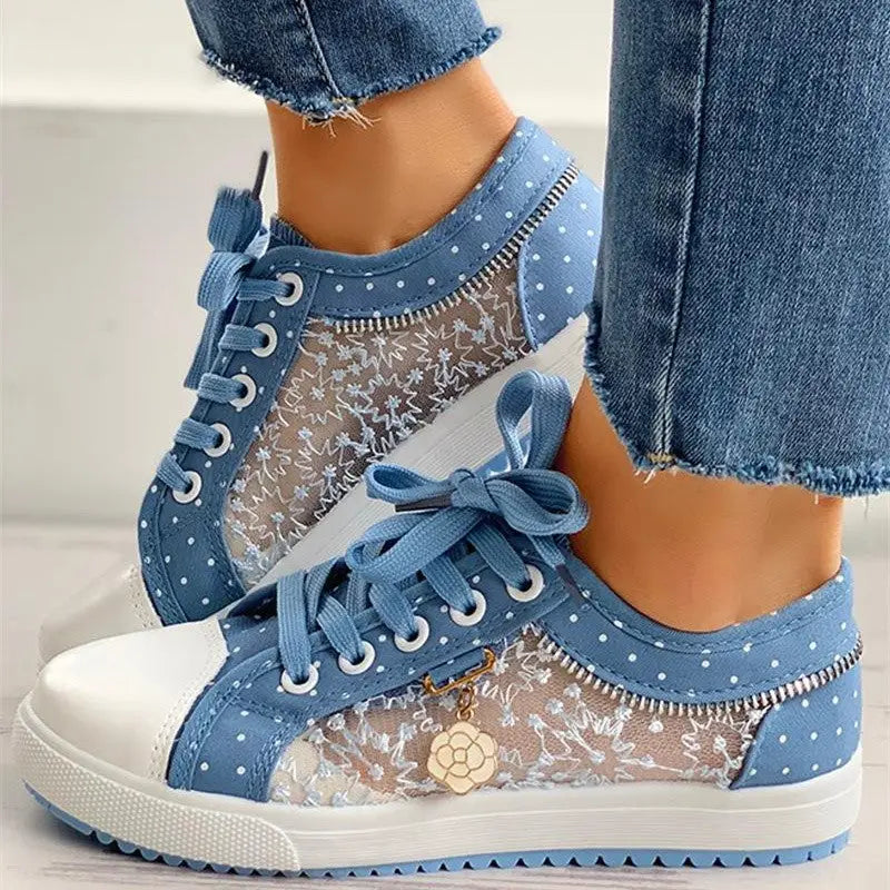 Blue polka dot lace sneakers.