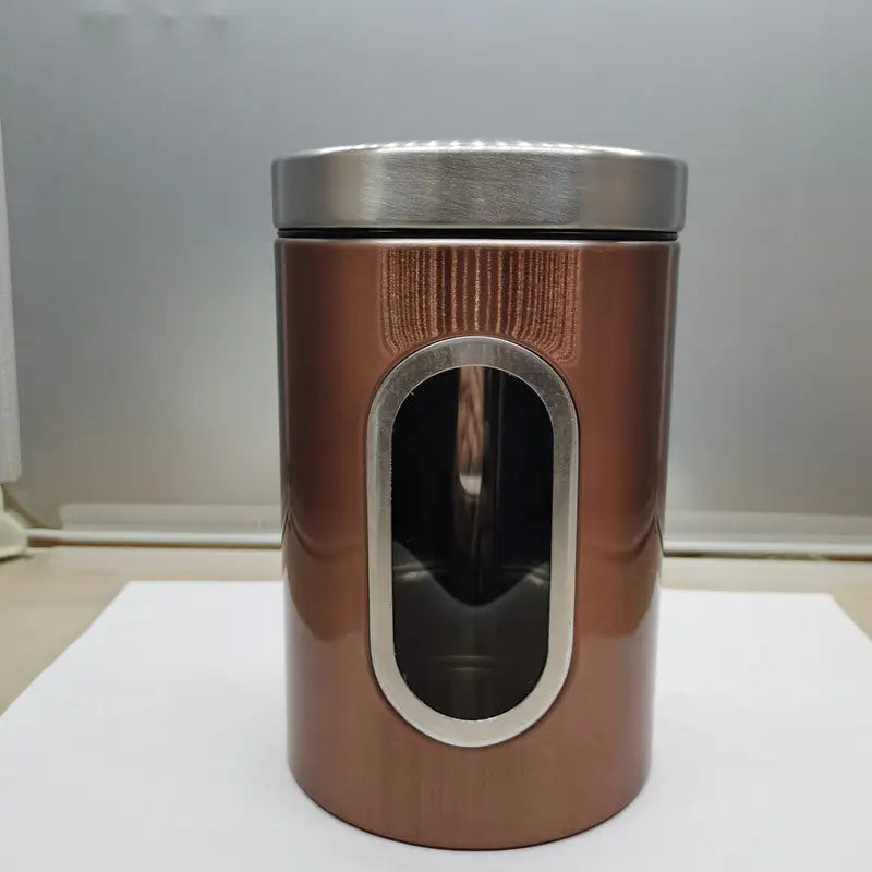 Copper-colored canister with viewing window.