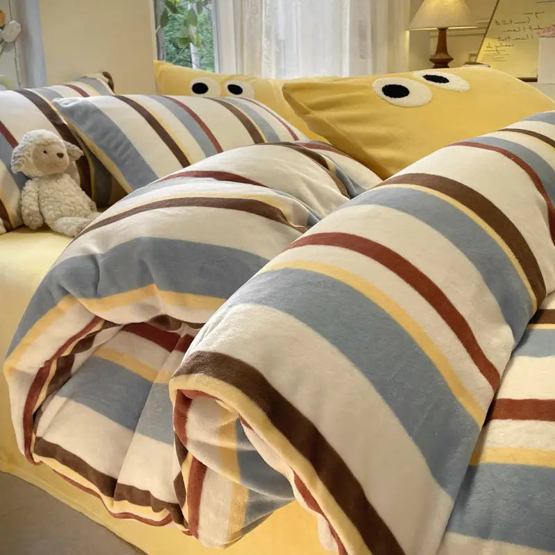 Striped bedding with cartoon eyes.