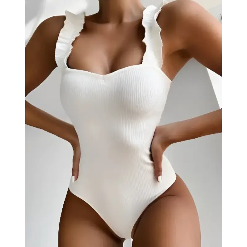 White ruffled one-piece swimsuit.