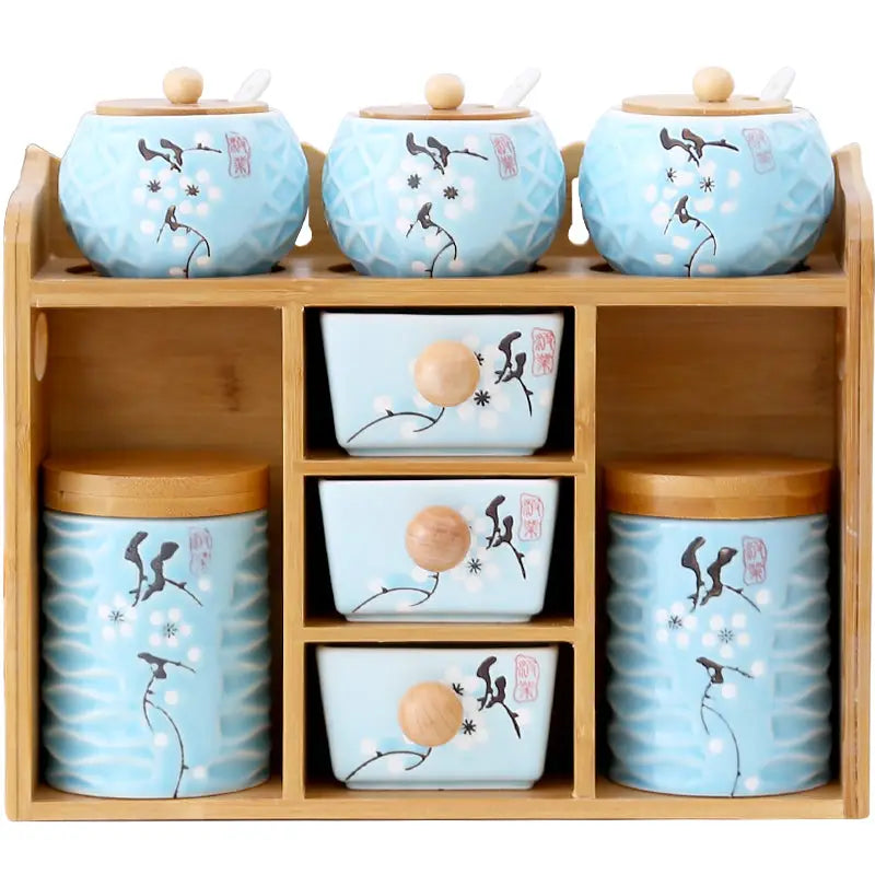 Light blue ceramic spice rack on Salt Sugar Glass Seasoning Box Shelf for organized storage