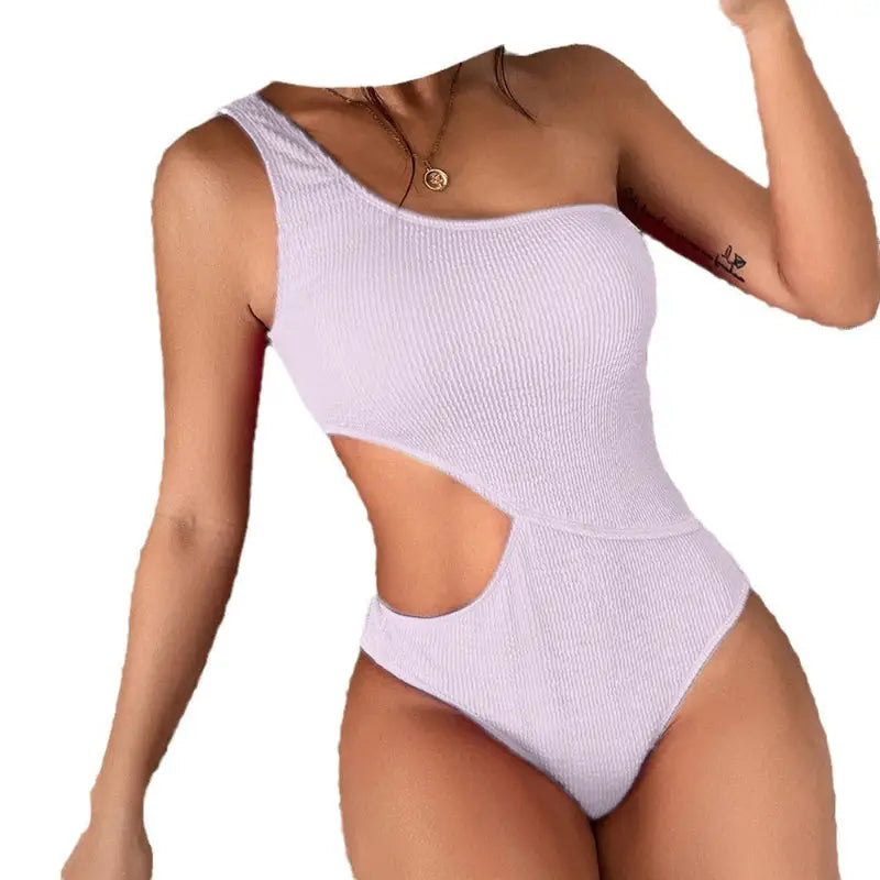 One-shoulder cut-out swimsuit.