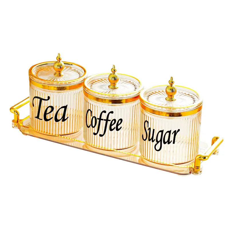Gold-trimmed tea coffee canisters on a tray, perfect for quirky canisters and fresh toast coffee