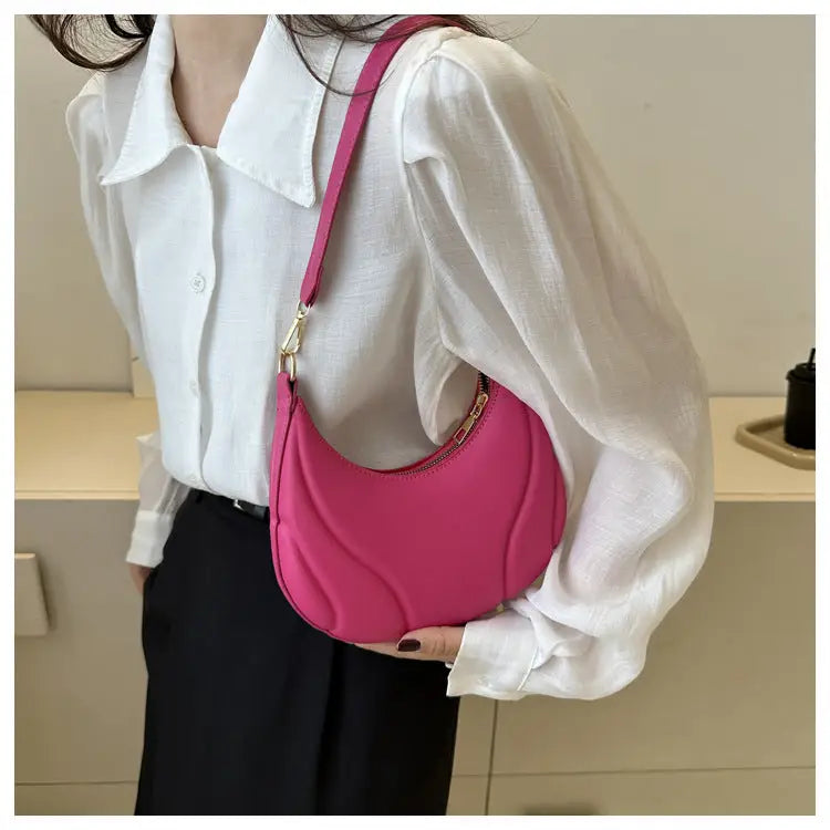Pink crescent-shaped textured trend shoulder bag purse for chic fashion style