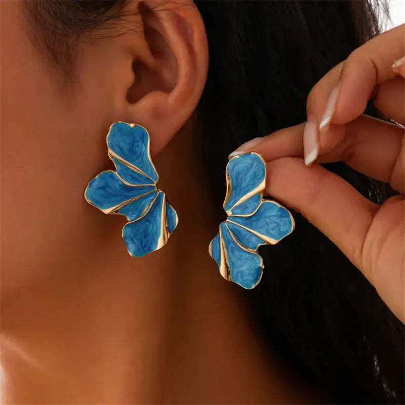 Vintage-inspired blue and gold half flower stud earrings for stylish accessory wear