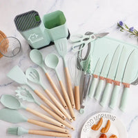 Mint-green kitchen utensil set.
