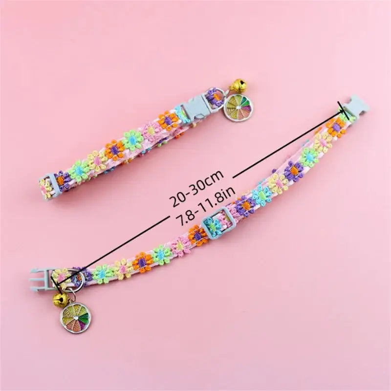 Floral cat collars with bells.