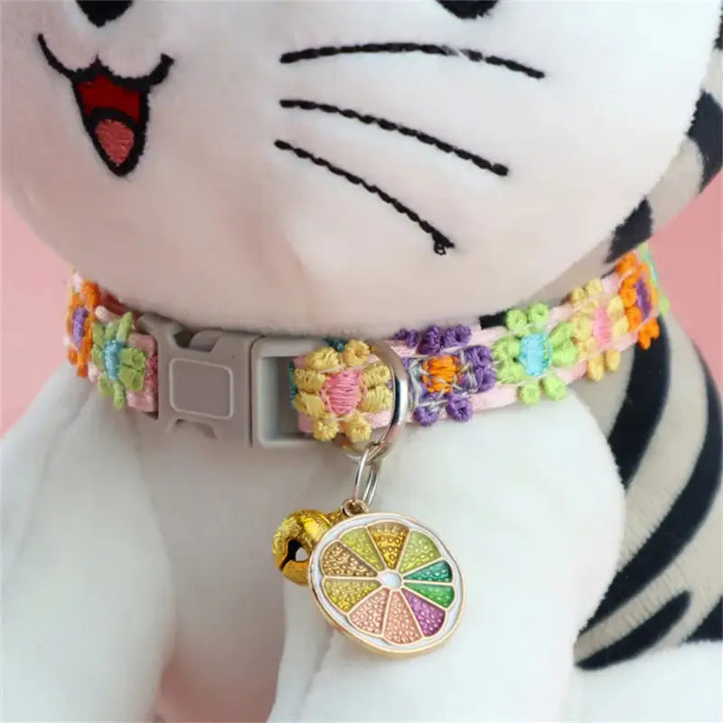 Floral cat collar with lemon charm.