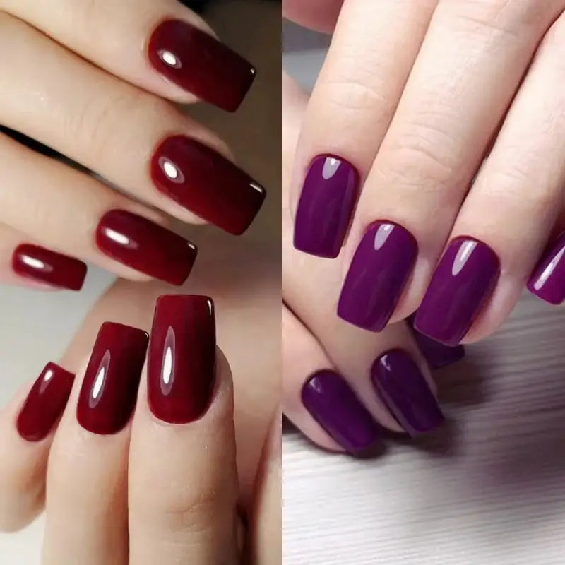 Glossy, dark-colored manicured nails.