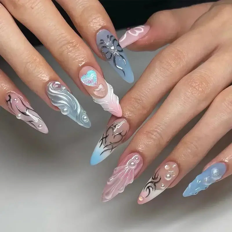 Elaborate, stiletto-shaped nail art.