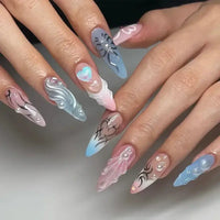 Elaborate, stiletto-shaped nail art.