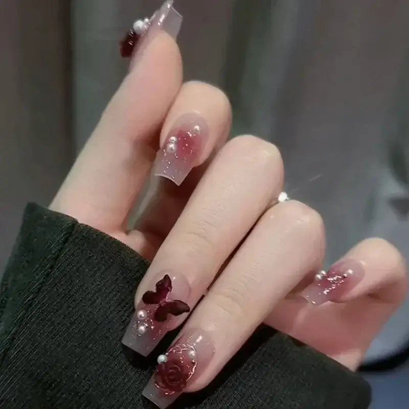 Elegant, decorated, long fingernails.
