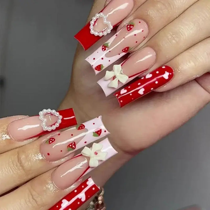 Long, decorated fingernails.