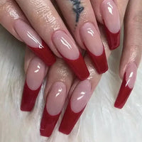 Red-tipped French manicure.