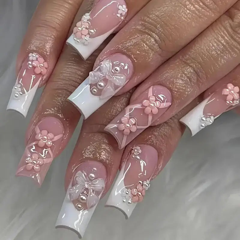 Elaborate, decorated fingernails.