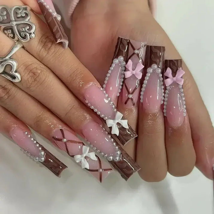 Elaborate, chocolate-themed nail art.