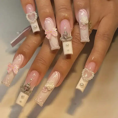 Elaborate, decorated fingernails.