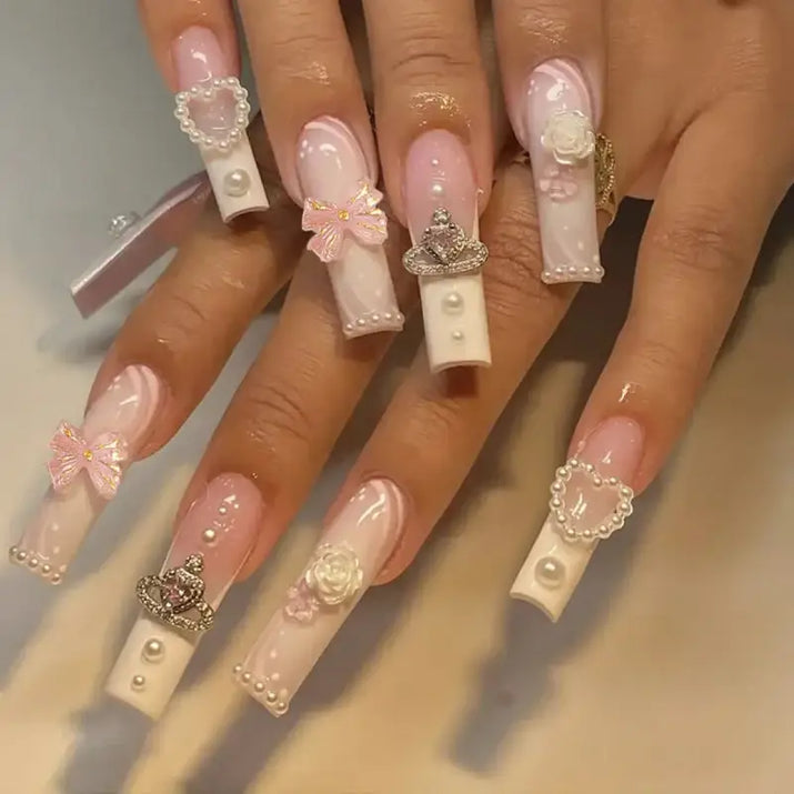 Elaborate, decorated fingernails.
