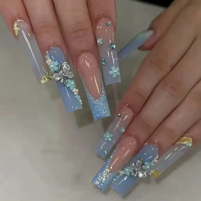 Elaborate, decorated fingernails.