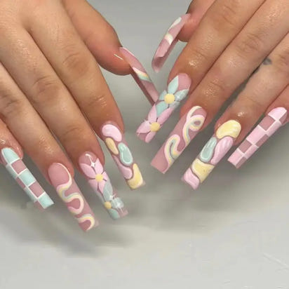 Pastel-colored, long, decorated nails.
