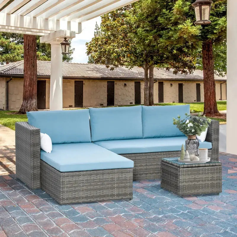 Wicker outdoor loveseat sofa with light blue cushions from 3 Piece Patio Furniture Set