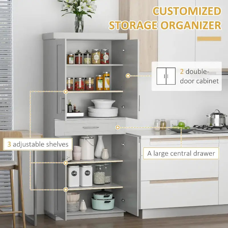 Gray kitchen pantry cabinet with shelves and drawer for organized storage