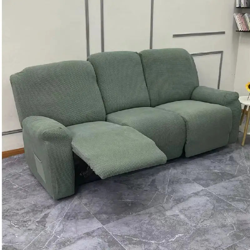 Green recliner sofa cover.