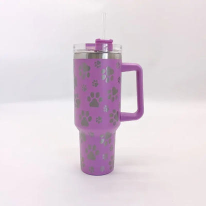 Purple paw-print travel mug with handle.