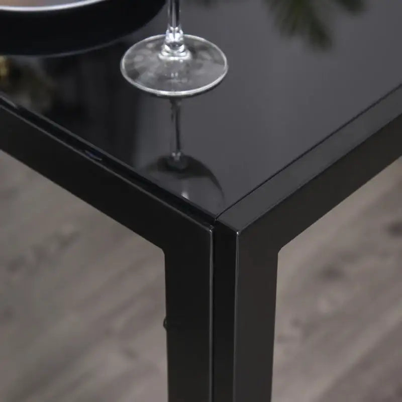 Black glass-topped table.