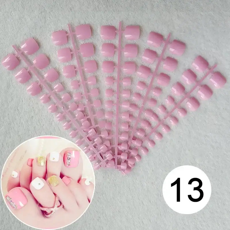 Pink artificial toenails.