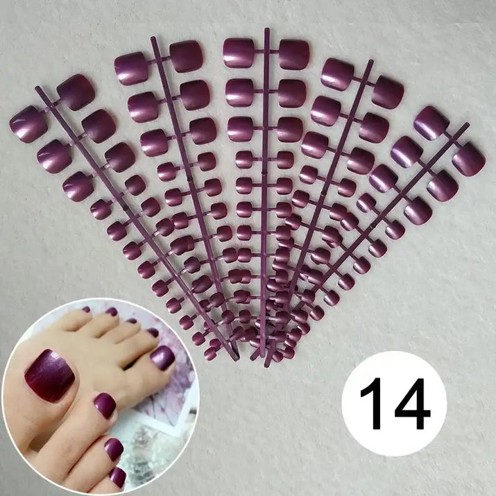 Maroon fake toenail sets.