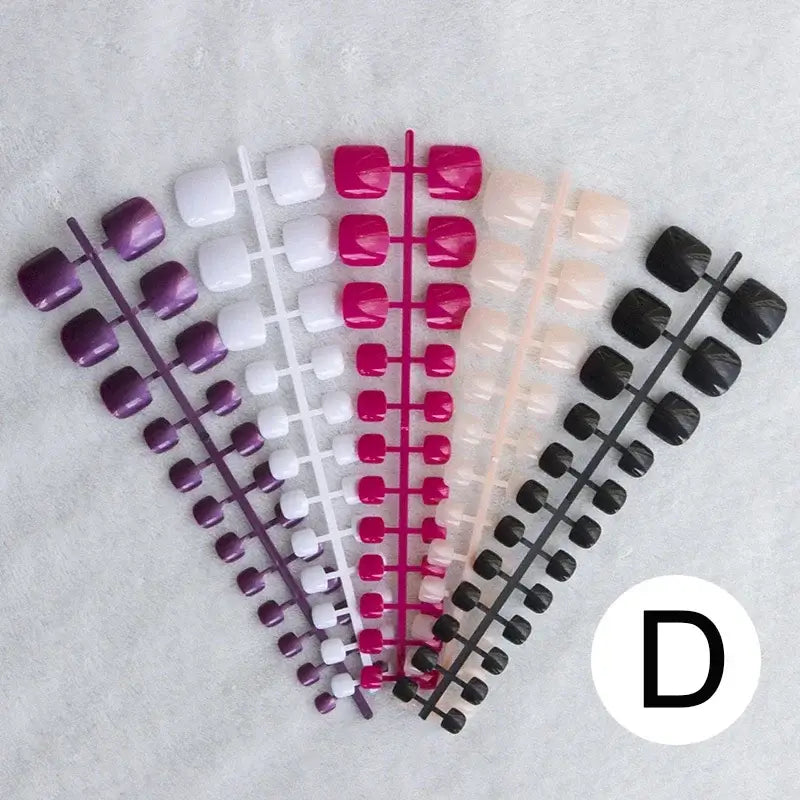 Colorful artificial toenail sets.