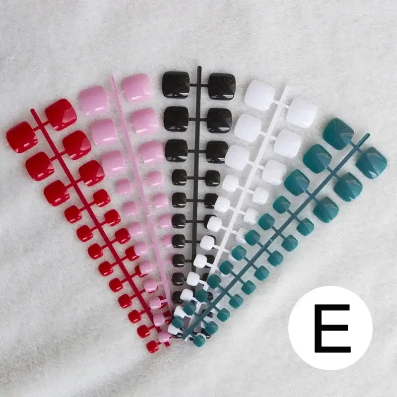 Colorful artificial toenail sets.