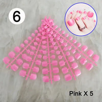 Pink artificial toenail set.