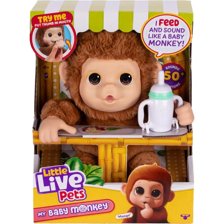 Boxed toy monkey with packaging highlighting features like 'feeds like a baby monkey' and 'sounds like 50 monkeys'.