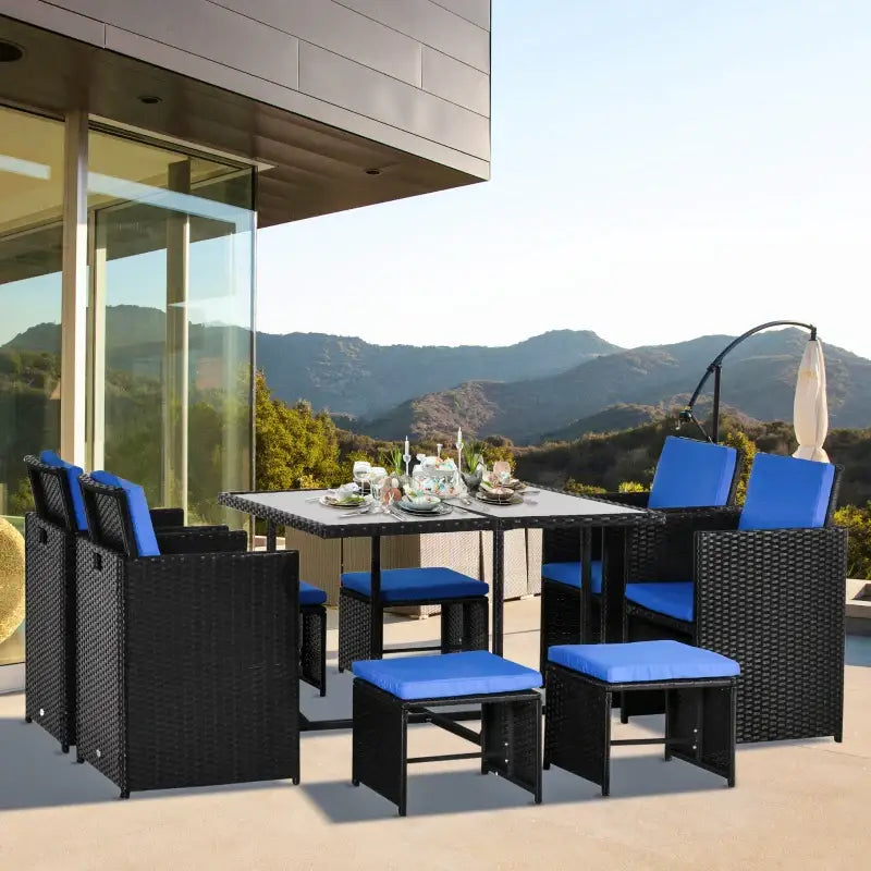 Wicker patio dining set with blue cushions from 9-Piece Wicker Patio Dining Collection
