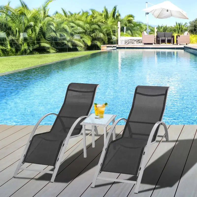 Outdoor patio pool lounge chairs set with side table for relaxing by the pool