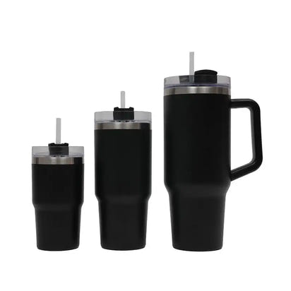 Set of black insulated tumblers with handles and straws on a white background