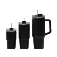 Set of black insulated tumblers with handles and straws on a white background