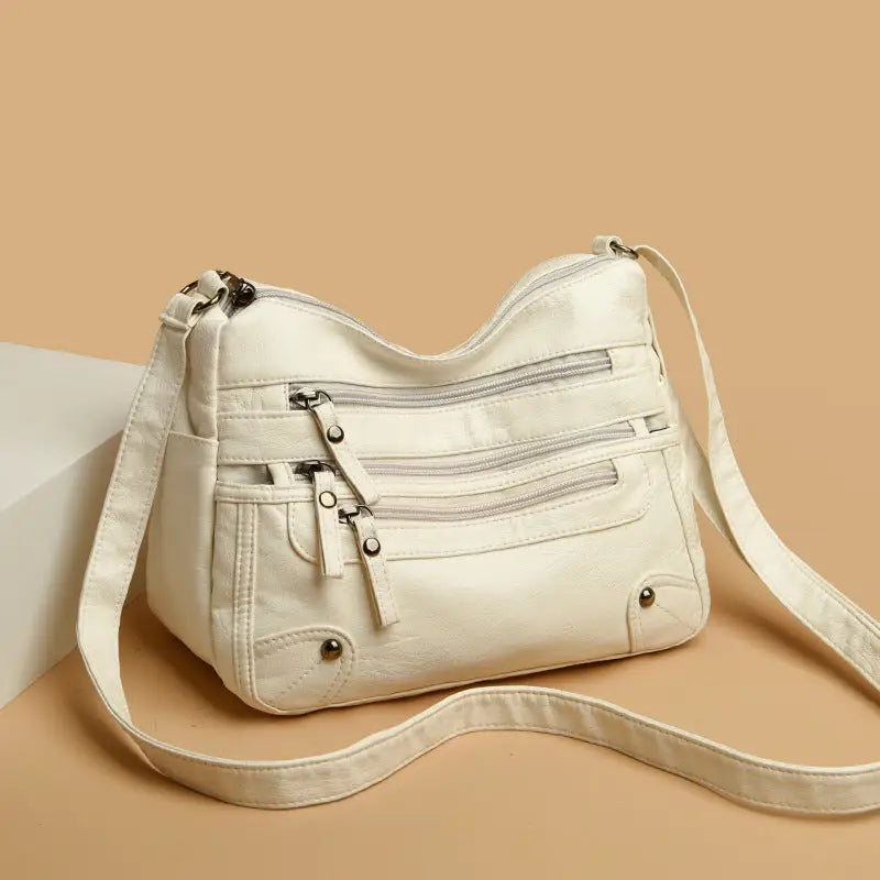 Multi-pocket middle-aged and elderly women's bag soft leather bag 2024 new one-shoulder crossbody bag women's backpack middle-aged mom bag