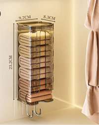 Wall-mounted towel organizer with folded towels inside, showing dimensions, on a neutral background.