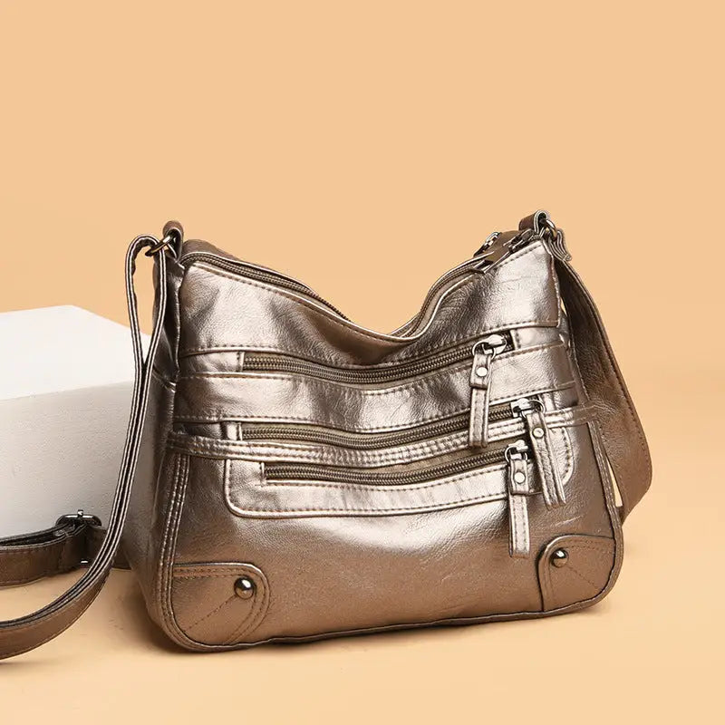Multi-pocket middle-aged and elderly women's bag soft leather bag 2024 new one-shoulder crossbody bag women's backpack middle-aged mom bag
