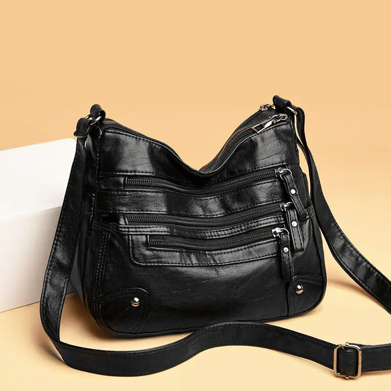 Multi-pocket middle-aged and elderly women's bag soft leather bag 2024 new one-shoulder crossbody bag women's backpack middle-aged mom bag