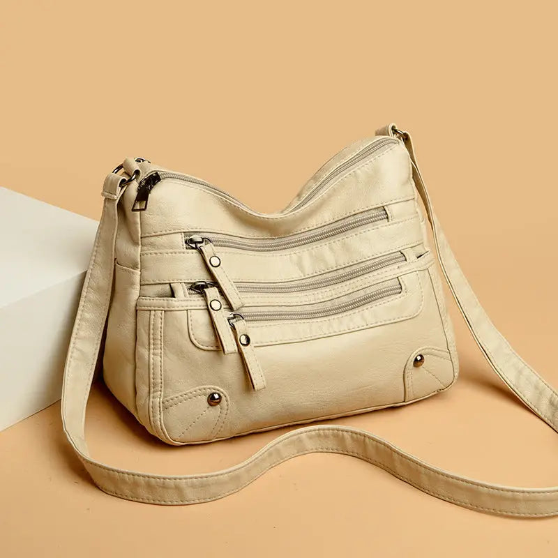 Multi-pocket middle-aged and elderly women's bag soft leather bag 2024 new one-shoulder crossbody bag women's backpack middle-aged mom bag