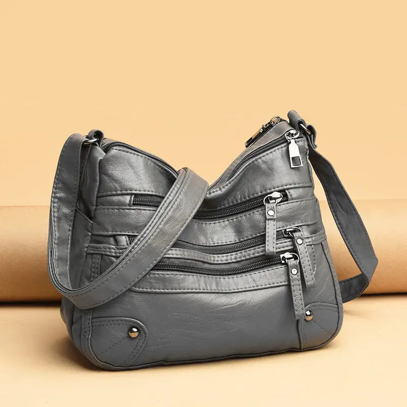 Multi-pocket middle-aged and elderly women's bag soft leather bag 2024 new one-shoulder crossbody bag women's backpack middle-aged mom bag