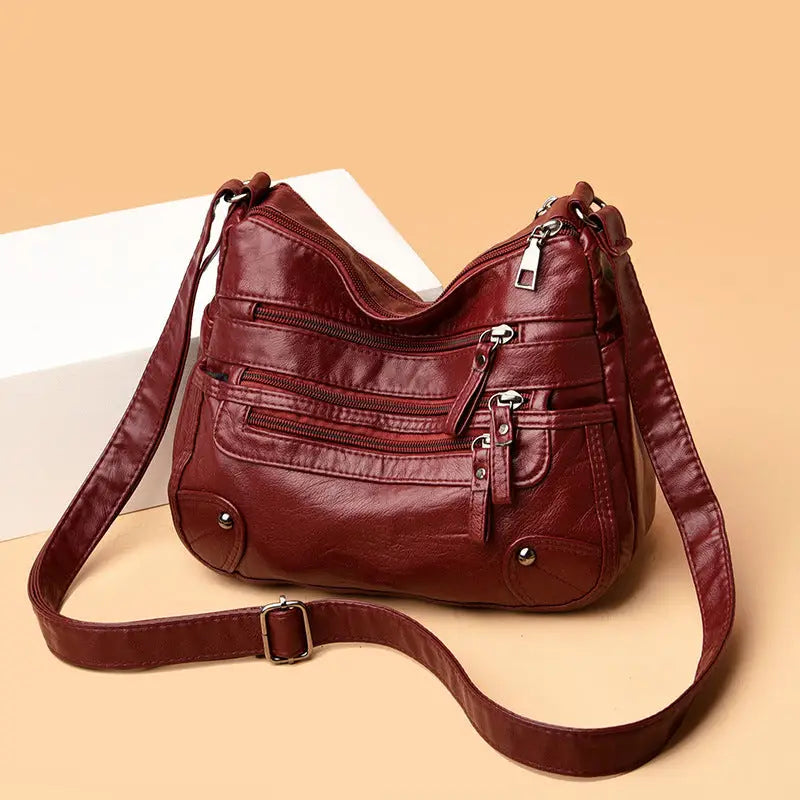 Multi-pocket middle-aged and elderly women's bag soft leather bag 2024 new one-shoulder crossbody bag women's backpack middle-aged mom bag